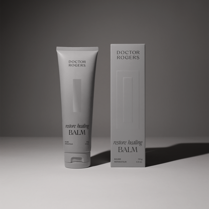 Soothing, natural Restore Healing Balm for eczema and sensitive skin relief in a 4oz tube next to its recyclable packaging.