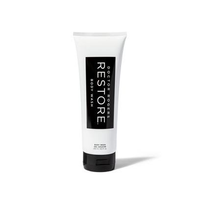 White and black eco-friendly, sustainable packaging 8 fl. oz tube of Doctor Rogers Restore Body Wash | Best antibacterial body wash for mena nd women, made with best fragrance-free, natural ingredients on white background