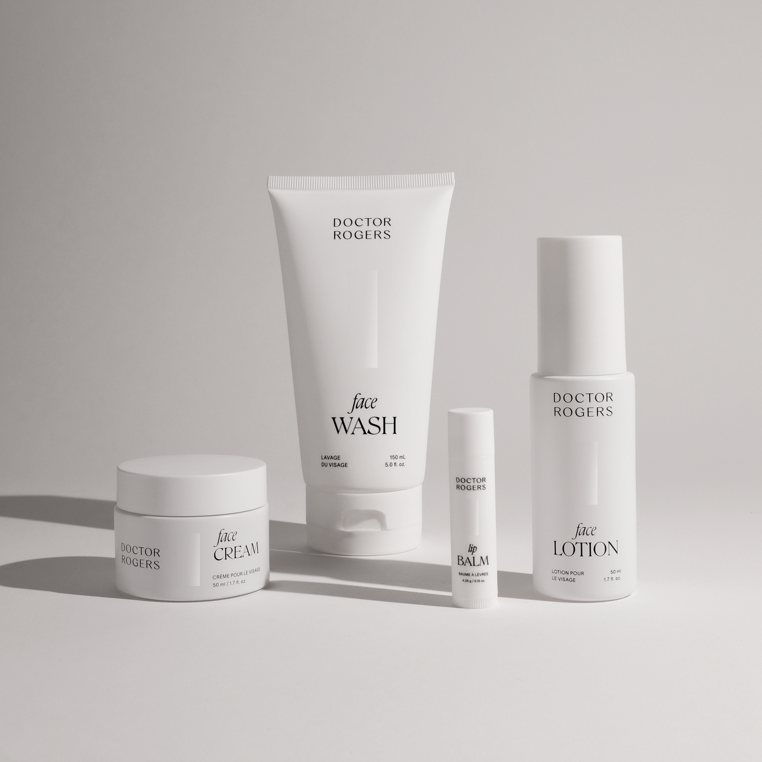 Black and white recyclable packaging of Doctor Rogers Face Cream (Best anti-aging hydrating moisturizer, safe for sensitive and dry skin), Doctor Rogers Face Wash (the best face wash for acne, oily skin and sensitive skin), Doctor Rogers Face Lotion (Best hydrating moisturizer for oily skin) and Doctor Rogers Lip Balm (best lip balm for dry, chapped lips)