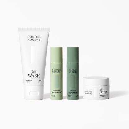 Doctor Rogers Travel Size Starter Set with mini cleanser, moisturizer, and serums in TSA-friendly bottles.